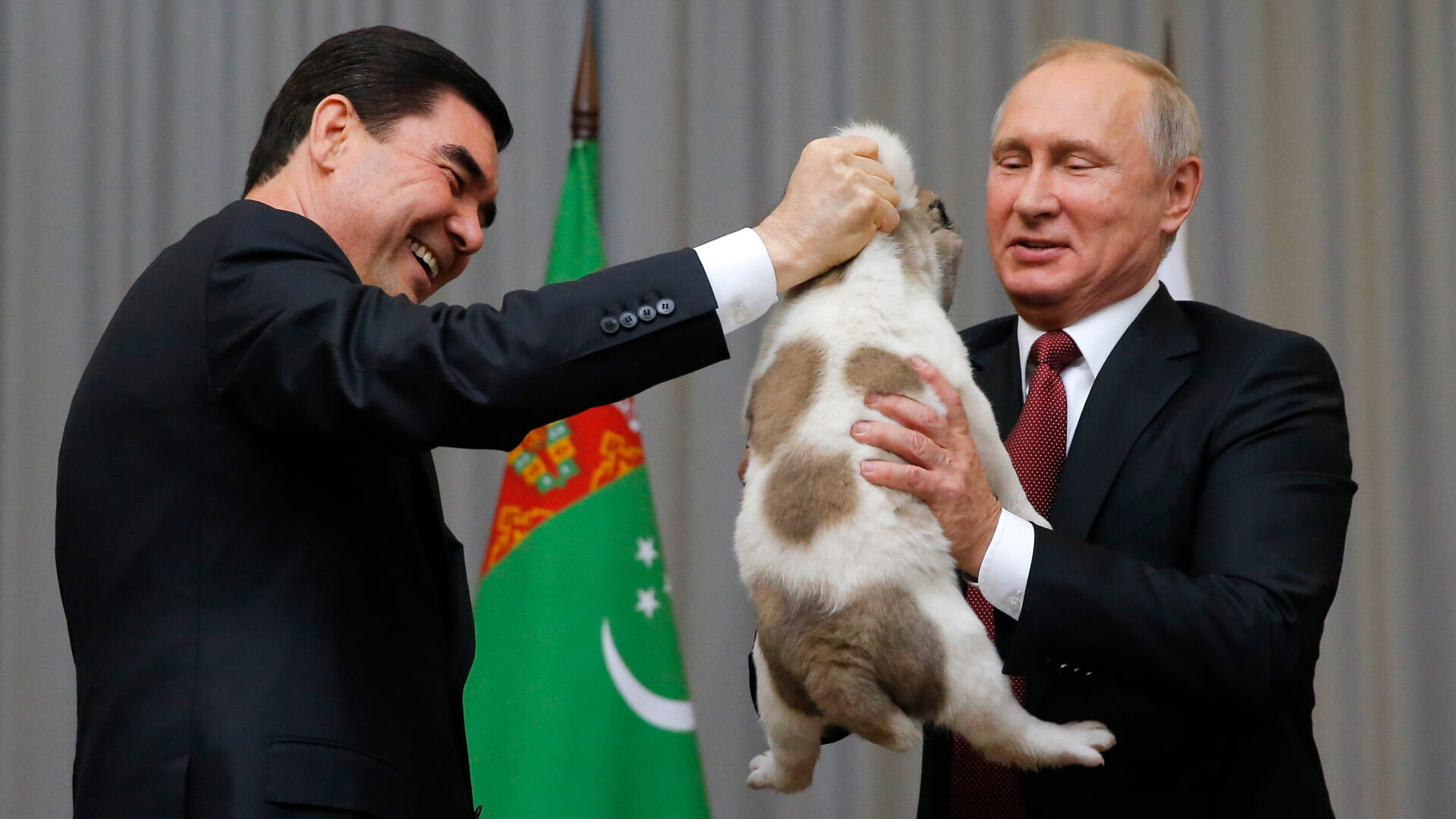 Turkmenistan's authoritarian leader unveils huge golden dog statue in the capital